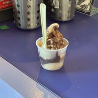 Kids swirl with hot fudge and caramel  at Ice Queen in Portland