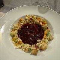 Carpaccio di barbabietola con dadolata di pesche, sedano e altre verdure e fresche e croccanti!  at 53040 Ristorante Pizzeria in Cetona