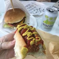 Classic hot dog with sauerkraut, ketchup and mustard  at iVegan in Rome