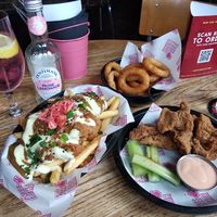 Katsu chicken loaded fries, onion rings and chicken wings at Freeloada  in Brighton