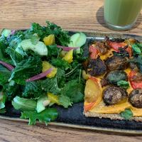 Pizza and salad  at Naya Studio in Paris