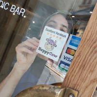 happycow stickers being positioned! at Naya Studio in Paris