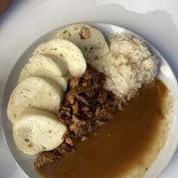 Dumplings with sauerkraut and dark sauce  at Shromaždiště in Prague