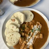 Dumplings with “meat” in a hearty pepper sauce  at Shromaždiště in Prague