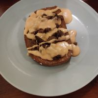 Tostet bread with cheese, garlic and meat substitute - so good! at Shromaždiště in Prague