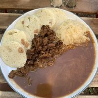 Bread dumplings, soy chunks with gravy and cabbage  at Shromaždiště in Prague