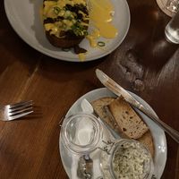 Topinka (deep fried bread with veggie meat, cheeze sauce and garlic - top) and fish less spread (bottom)  at Shromaždiště in Prague
