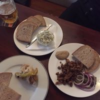 No fish spread, pickled sausage, and “meat pieces with bread, mustard and onion.  at Shromaždiště in Prague