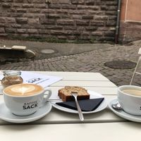 Oatmilk Cappuccino, bananabread and Americano  at Kaffeesack in Baden Baden