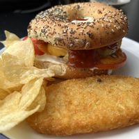 “Hangover Cure” Sausage Patty, Egg, Garlic & Onion Cream Cheese, Tomato, Cheddar, Aioli & BBQ Sauce with Bacon  at Sable in Richmond