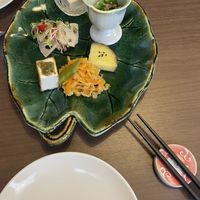 Appetizer, sweet potato, cucumber salad, lotus (raw, which was new to me), the white thing is made of sake rests (trester)  at Naramachi Vegan Nabi in Nara