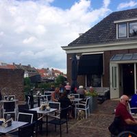 Outdoor seating and front at Aan de Gracht in Elburg
