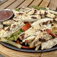 Chik’n Fajitas. (Really good). Cheese lettuce and wraps not shown in this pic)   at Moose Winooski's in Kitchener