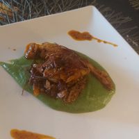 Bocado de pollo campero vegetal al vino blanco con ñoras y pimientos choricero. at Go Vegan by Adrian Muser in Altea