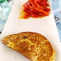 Roasted marinated red pepper with chickpea omlette stuffed with tomato & onion at Manumaga in Mojacar