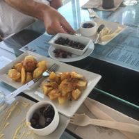 Hummus (best humous ever) &  olives & fresh bread and spiced potatoes  at Manumaga in Mojacar