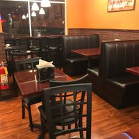 Interior seating at The Great Indian Cafe and Fast Food in Glendale Heights