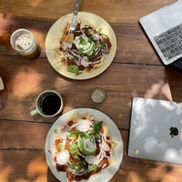 Vegan chilaquiles with red sauce and vegan cream   at Tierra in Tulum