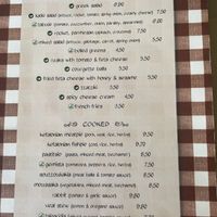 Clearly marked vegan menu with more daily specials inside as at the counter    at Palia Plaka - Παλιά Πλάκα in Kefalonia