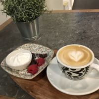 “Kladdkake bite” with whipped cream (soy) and oat milk cappuccino  at Cortado Coffee Shop in Halmstad