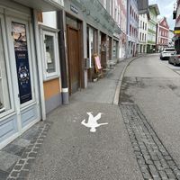 Entrance by the pink flyers on the leftt  at Naked Flowers in Mondsee