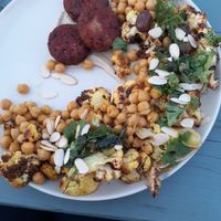Roasted cauliflower and fennel with curried chickpea and falafel. at L'abri in Cheticamp
