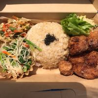 Vegan take out bento with brown rice, salad, plant-based fried nuggets, and veggies! at Nishimaki Gohan in Tokyo