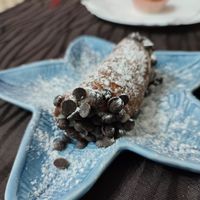 Cannolo filled with banana and coconut at Trinacria in Samarate