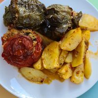 3 stuffed peppers and potatoes. All cold. at Macoo Eatery in Crete