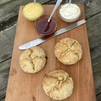 Fourth round of the high tea: Scones with lemon curd, jam and cream. at Theetuin Het Kaslokaal in Oostkapelle