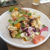 whole wheat wrap with roasted cauliflower & smoked tempeh at Circus Restaurant in Antwerpen