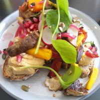Shiitake toast with miso hummus, Jerusalem artichoke, pomegranate and a few pieces of shiitake mushroom at Circus Restaurant in Antwerpen