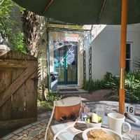 Outside eating in beautiful setting at Hibiscus Cafe in Grayton Beach