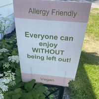 I swear it wasn't me who took a bite out of the sign.  at Emy Delights & Bites - Pop Up in Hyde Park