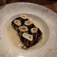 Vegan banana breadpudding with vegan custard. at Abbey Hotel in Battle