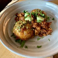 Fried potatoes with cilantro, tempeh chorizo, and chimichurri   at 600 Kitchen and Bar in Kalamazoo