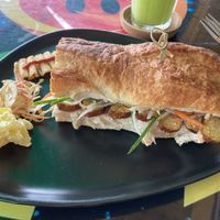 Banh mi with smoked tofuu  at Juice From Mars in Takua Pa