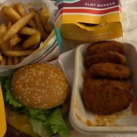 Vegan burger, large fries with herbs and buffalo faux  chicken wings 💚 at PLNT Burger - H St in Washington