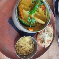 Vegan curry served with couscous and naan at Noderstraun in Schiermonnikoog