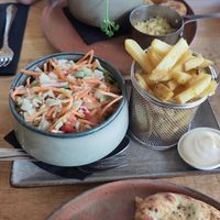 Fries and a salad come with every main course, the mayonnaise is not vegan, but could be replaced with  ketchul at Noderstraun in Schiermonnikoog