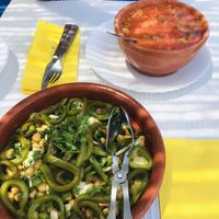 Grão de bico de coentrada e pimentos assados e tomatada com ovo que também servem sem. at O Melidense in Melides