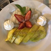 Mango sticky rice (ask to hold the whipped cream for vegan)  at Yoya's Thai Kitchen in Albufeira