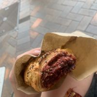 Beetroot and quinoa sausage roll  at Milkwood Bakery in Berry