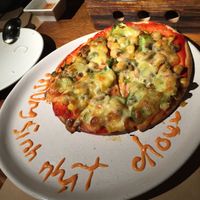 My kid got a pizza on her birthday- a greeting from the Chef at Doa Sen Vang Nha Hang Chay An in Ho Chi Minh City