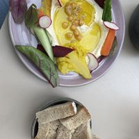 Hummus with bread and pickles  at Glückstein in Mannheim