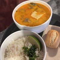 Vegan Thai chicken soup - with huera chicken and mushrooms and side rice (included in the price)  at Zuppa in Madrid