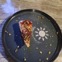 japanese-style cheesecake with strawberry compote and pistachio at Sham - Mont Royal in Montreal