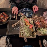 Chilli tofu, tofu and lemongrass in banana leaf and soybean cake sate skewers. at Sampurna in Amsterdam