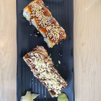 Top: Smokey salmon roll. Bottom: Ebi tempura roll  at Wellness Sushi in Denver