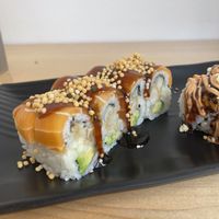 Smokey salmon roll. Really nice subtle Smokey flavor. The salmon has a great texture. Definitely a favorite    at Wellness Sushi in Denver